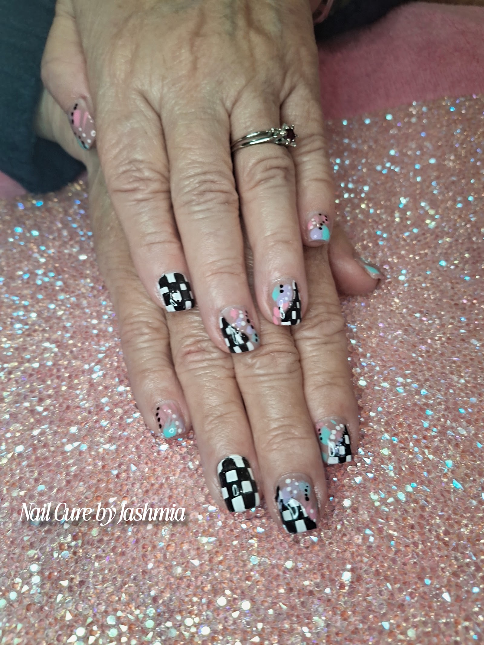Nail Cure by Jashmia LLC logo